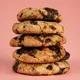 chocolate chip cookies stacked on top of each other