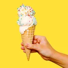 Scoop of ice cream in a cone